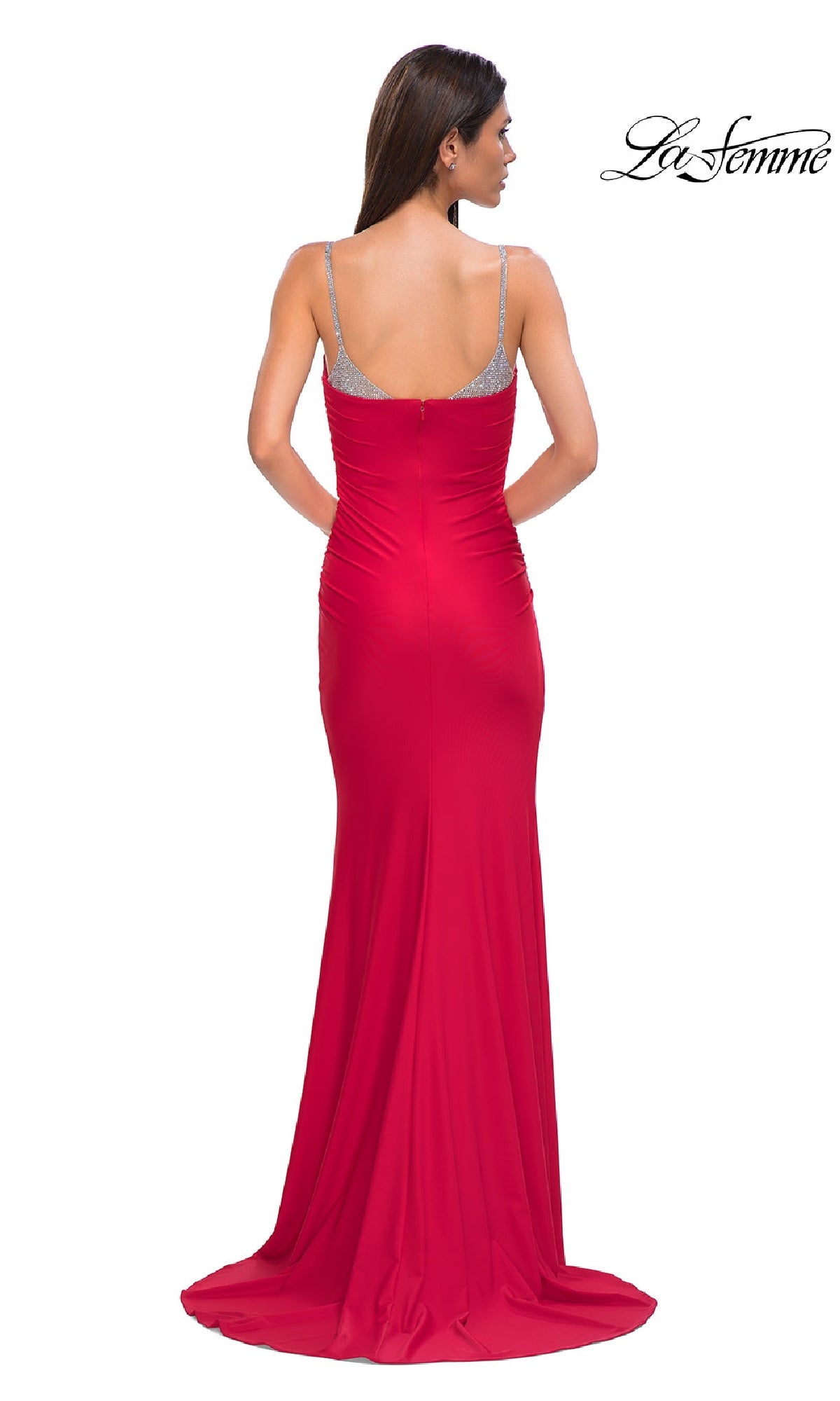 A woman faces away, wearing the La Femme 32939 Beaded-Neckline Long Prom Dress in red with silver straps, upper back details, and a slight train. The